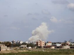 Smoke rises following an Israeli strike in the central Gaza Strip
