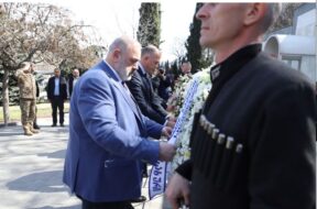 გ