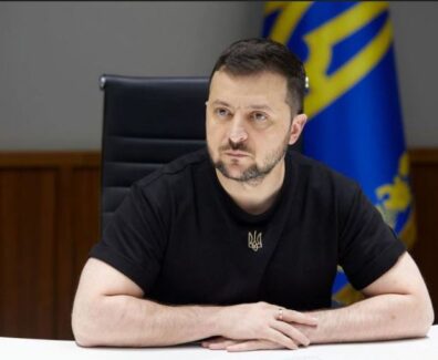გ