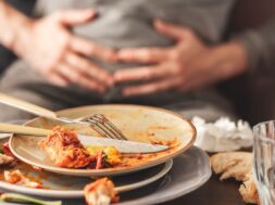 Woman,With,Bloating,And,Stomach,Pain,After,Eating