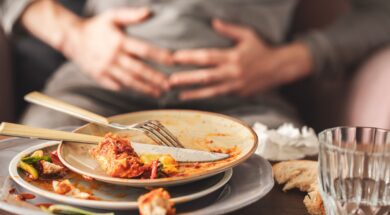 Woman,With,Bloating,And,Stomach,Pain,After,Eating